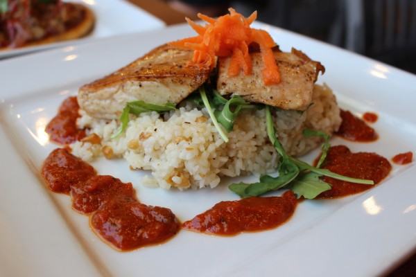 Here's a dinner entree: grilled opah belly with corn pilaf — so good! — and a tomato-mushroom-bacon sauce with capers.
